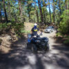 Guy surrounded by dust on a quad in Tenerife