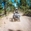 Guy surrounded by dust on a quad in Tenerife