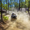 Guy surrounded by dust on a quad in Tenerife