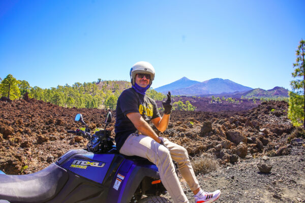 Guy on a Quad with Mount Teide behind him