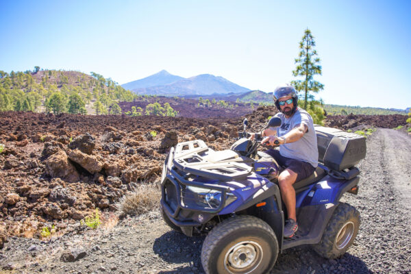 Guy on a Quad with Mount Teide behind him
