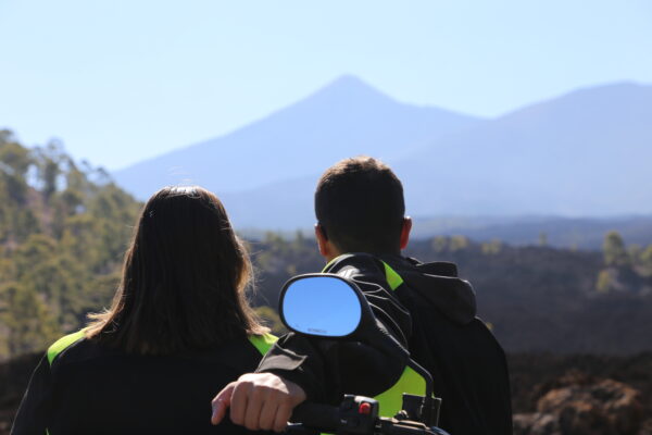 Couple looking at Teide Tenerife in front of a Quad