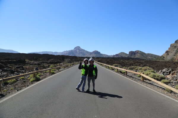 Couple posing on a on a road on Mount Teide in Tenerife