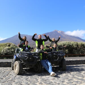 Group of happy people on Quads with Mount Teide behind them!