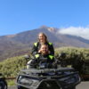 Couple on a quad with Mount Teide Tenerife behind them