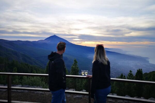 Two people drinking cava watching the Sunset at Teide