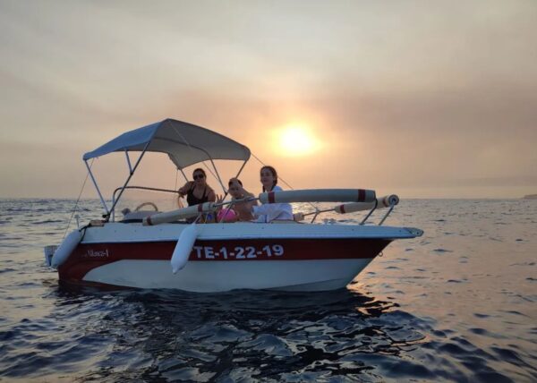 Self hire boat with sunset in Tenerife