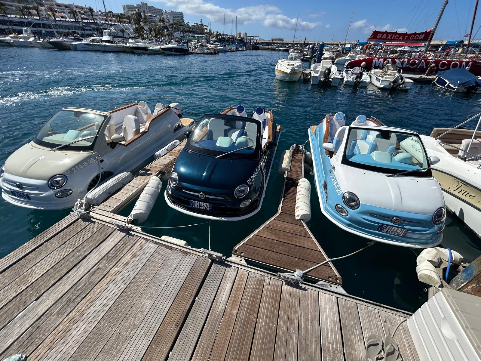 three Fiat 500 boats in the dock in Adeje in Tenerife