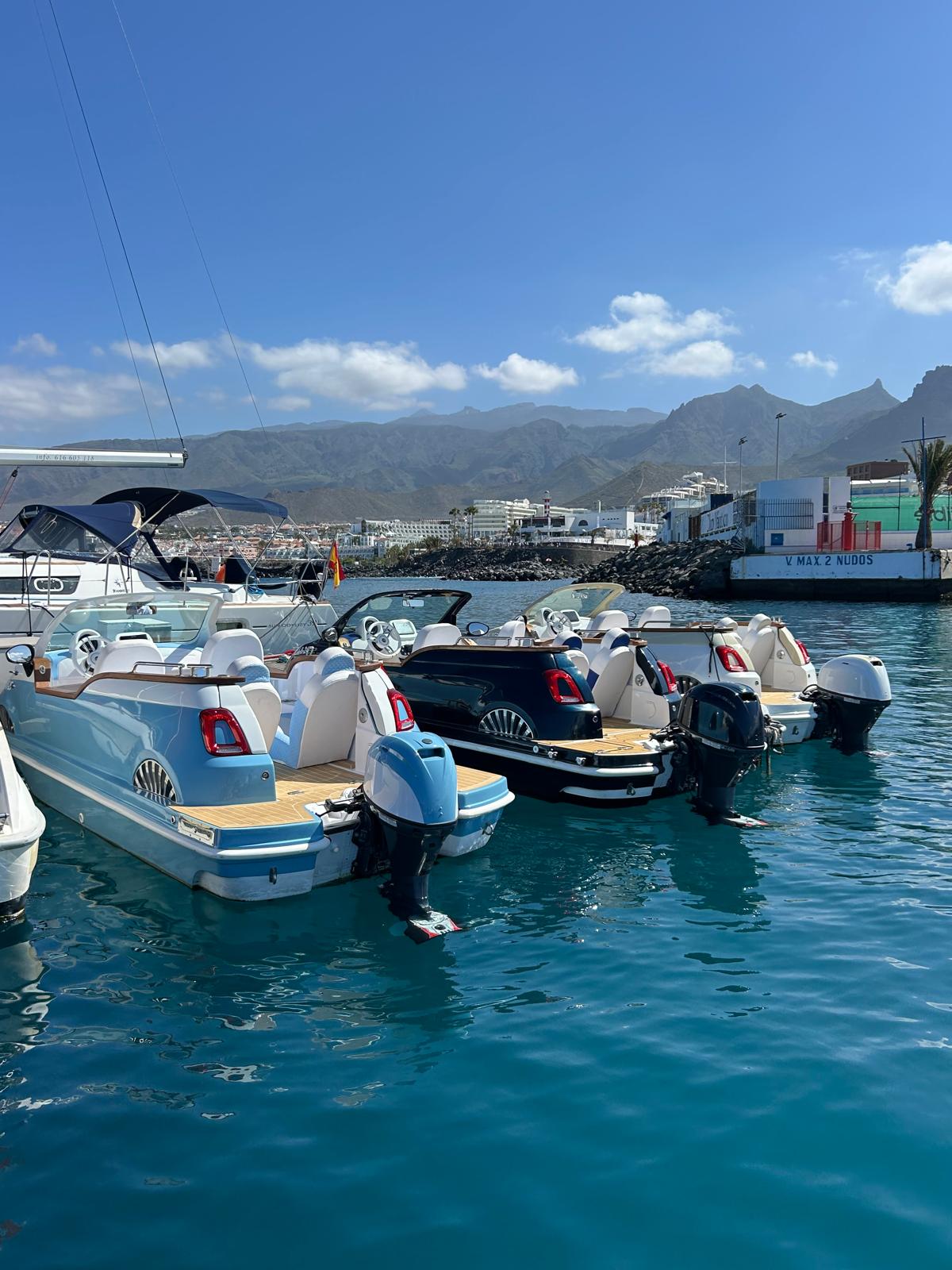 three Fiat 500 boats in the dock in Adeje in Tenerife