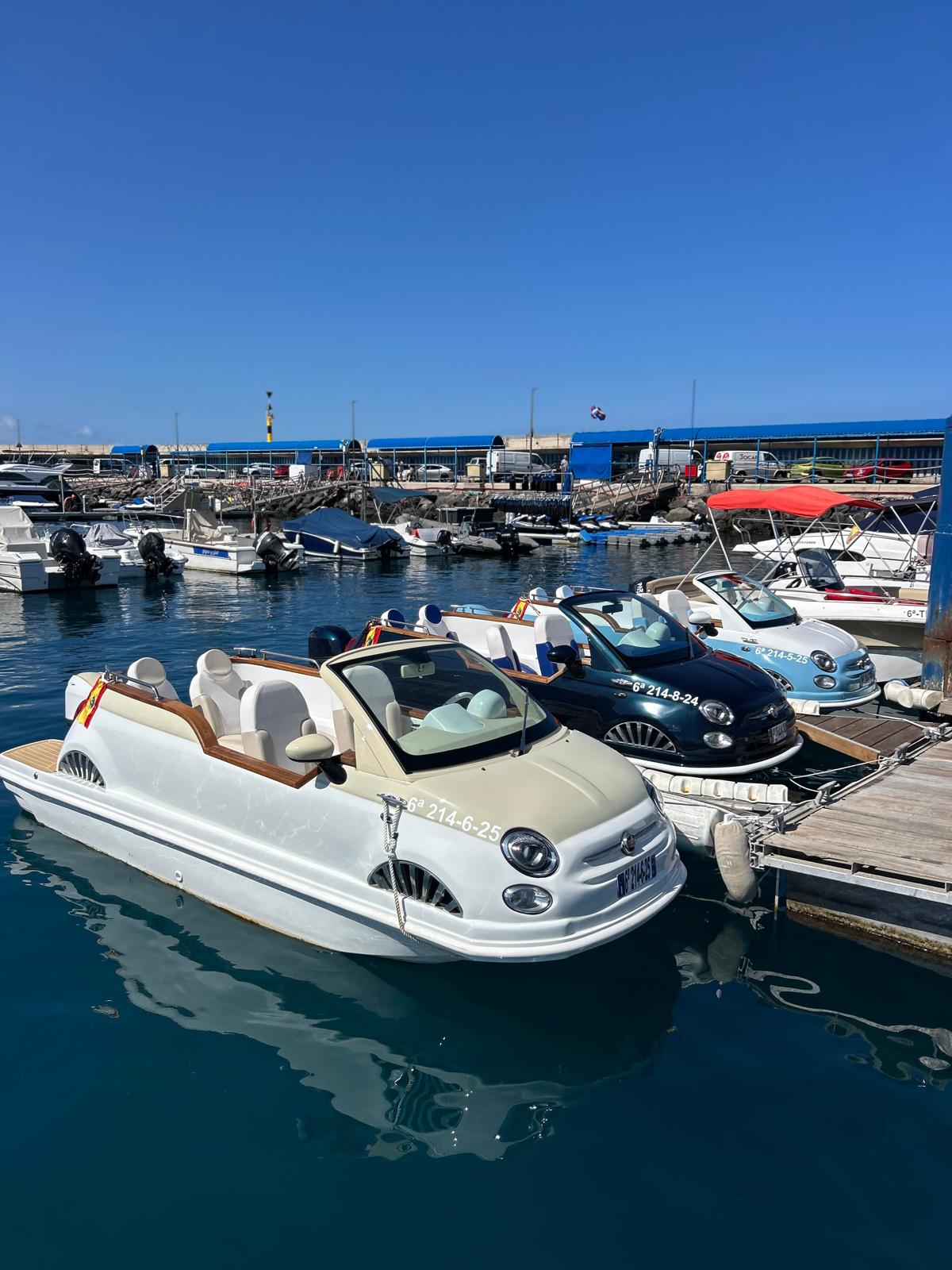 three Fiat 500 boats in the dock in Adeje in Tenerife